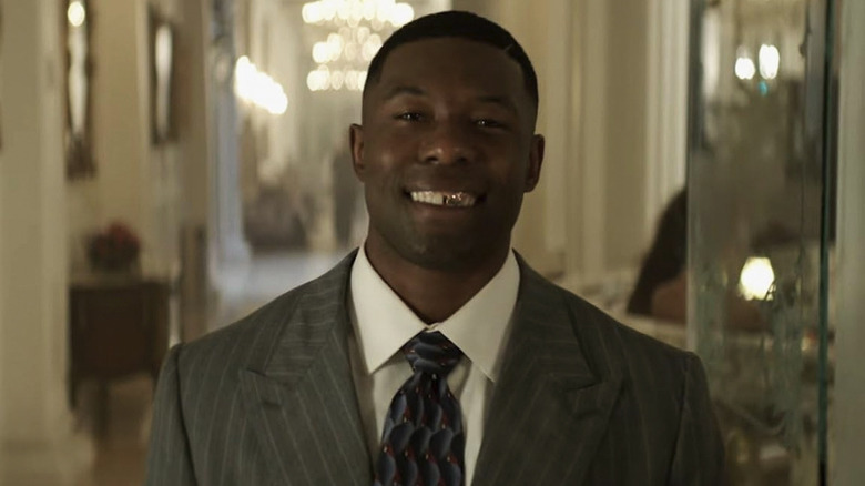 Trevant Rhodes wears a suit like Mike Tyson in Mike