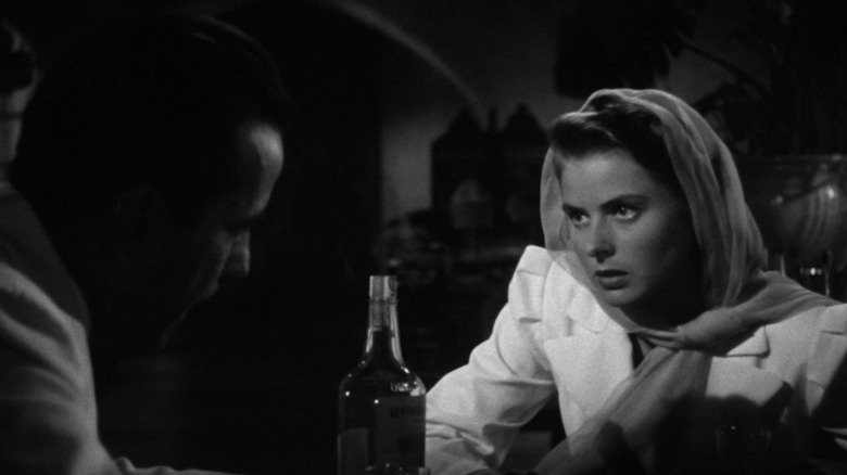 Humphrey Bogart as Rick Blaine and Ingrid Bergman as Ilsa Lund chatting alone in Casablanca