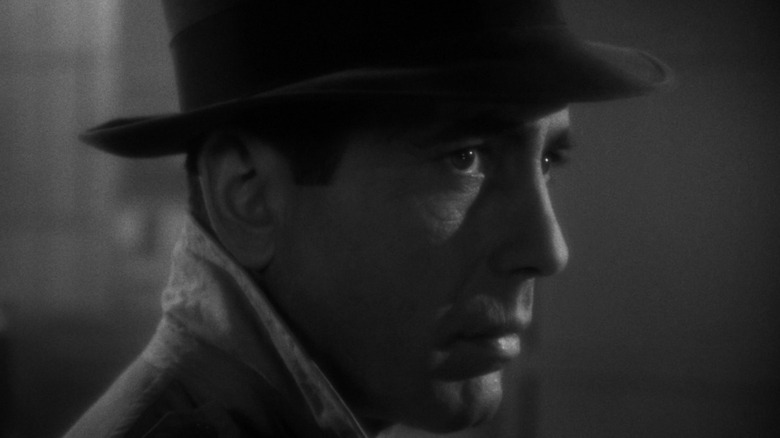 Humphrey Bogart as Rick Blaine wearing a hat (and looking wary) in Casablanca
