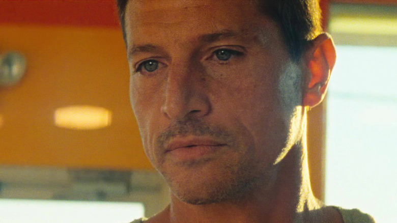 Simon Rex as Mikey Saber looking serious in Red Rocket