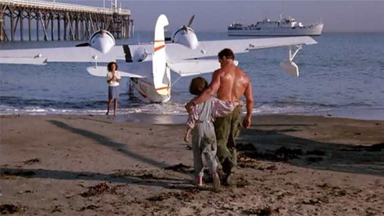 Rae Dawn Chong, Alyssa Milano, and Arnold Schwarzenegger in Commando