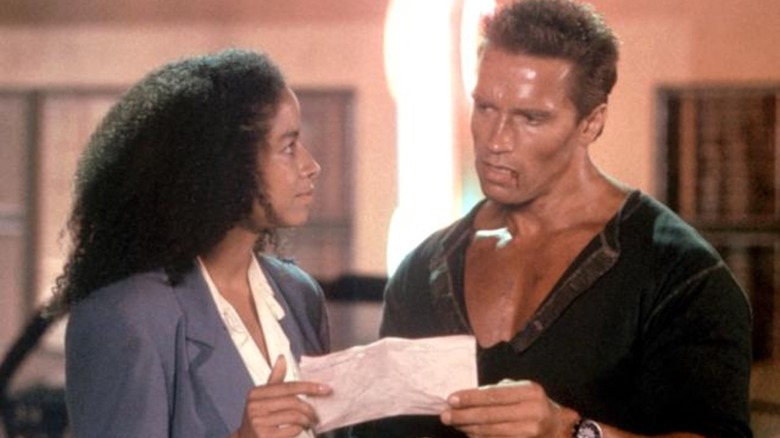 Rae Dawn Chong and Arnold Schwarzenegger in Commando