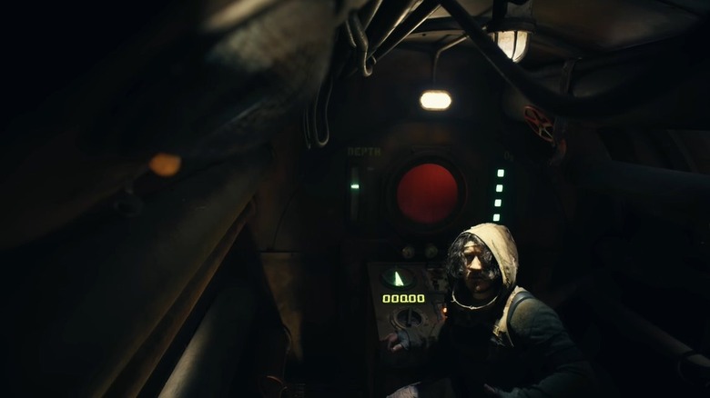 Mark Fischbach as The Convict at the console of a submarine in Iron Lung