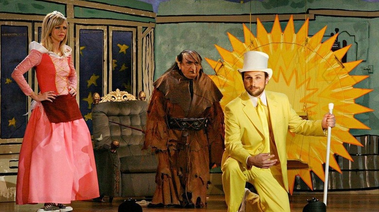 Kaitlin Olson, Danny Devito and Charlie Day in that he is always sunny in Philadelphia