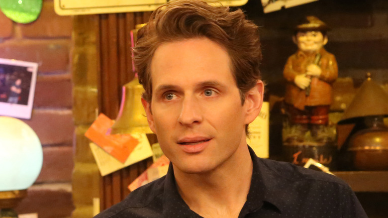 Dennis Reynolds (Glenn Howerton) standing alone in "It's Always Sunny in Philadelphia"