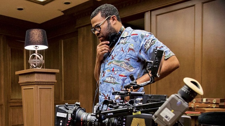 Jordan Peele directing a scene in Get Out.