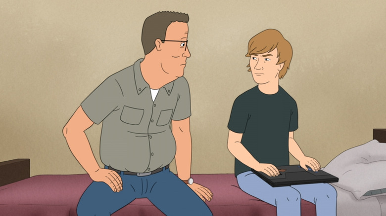 Hank Hill and Hank Good sitting on the good Hank bed together with a conversation on the king of the hill