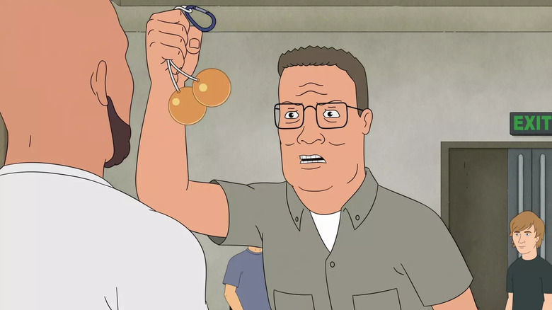 Hank Hill holding the talking nuts in King of the Hill