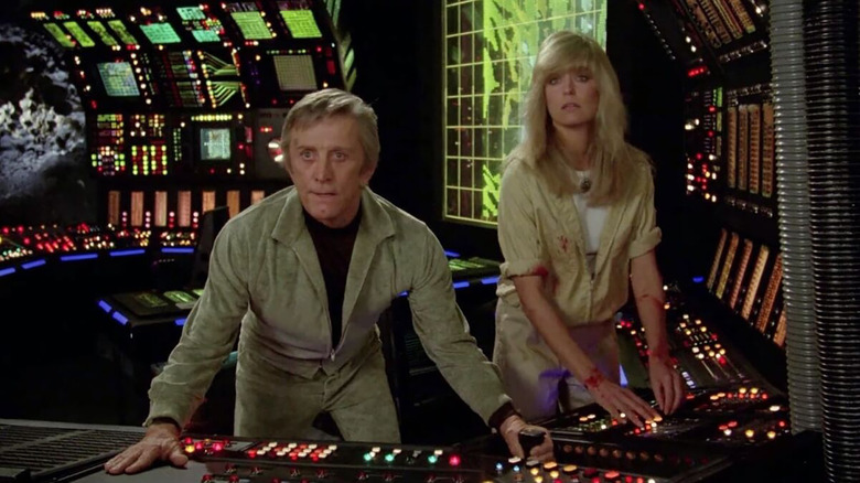 Adam and Alex in the spaceship in Saturn 3