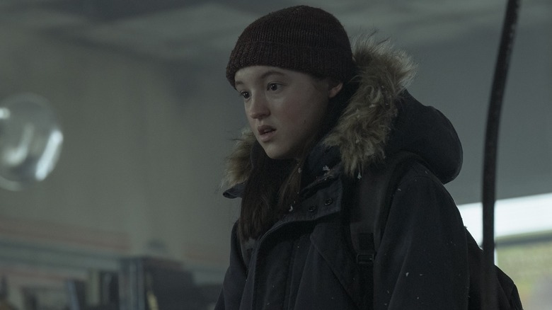 Ellie looking shocked in a coat in The Last of Us