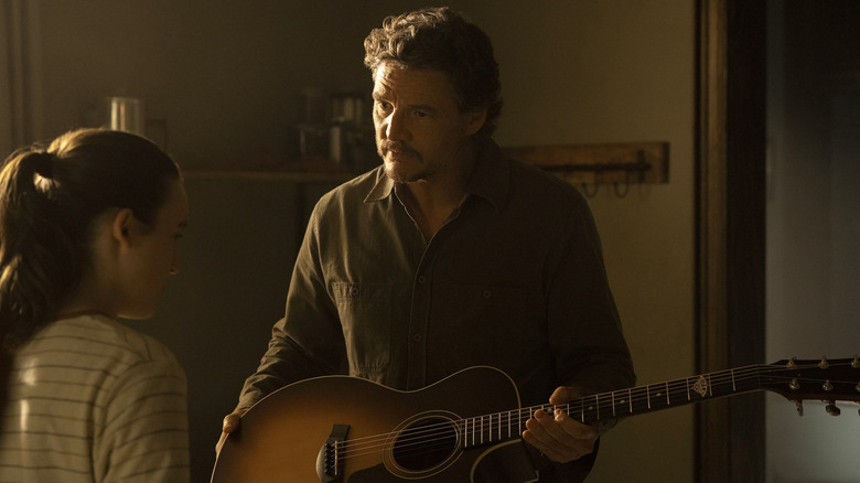 Pedro Pascal's Joel giving Ellie a guitar on The Last of Us