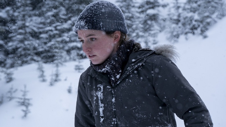 Abby wearing a hat in the snow on The Last of Us