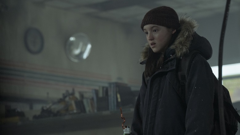Ellie looks shocked in a coat in the last of us