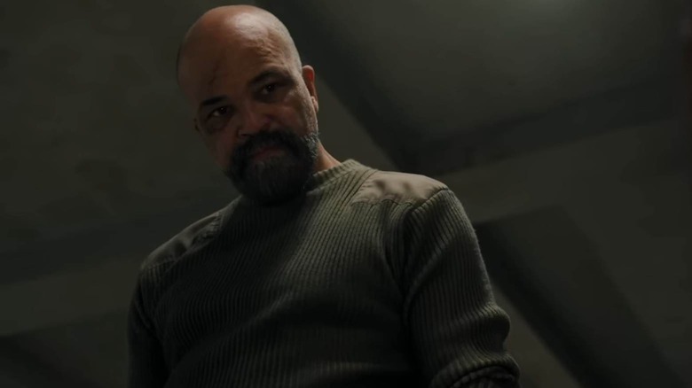 Jeffrey Wright as Isaac looking down at someone in The Last of Us