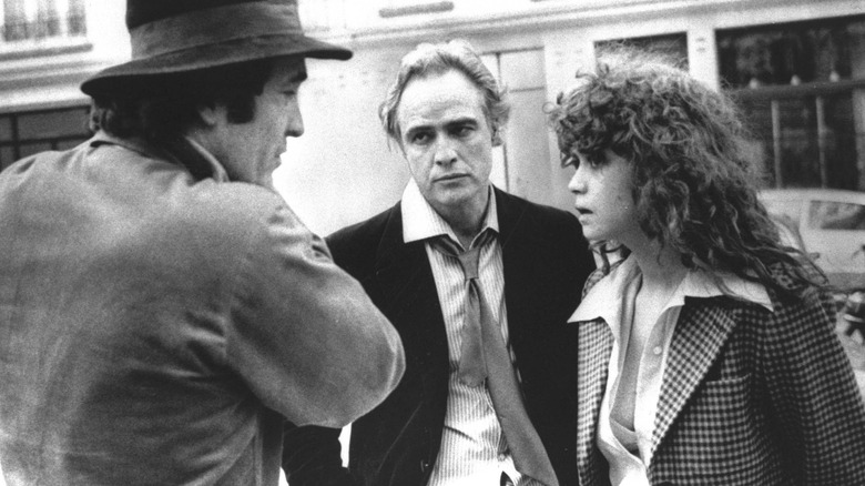 Marlon Brando and Maria Schneider and Bernardo Bertolucci