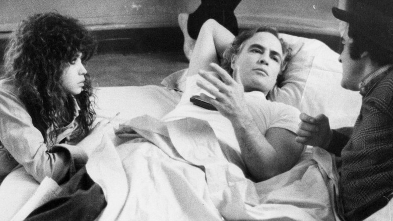 Bernardo Bertolucci and Marlon Brando and Maria Schneider filming Last Tango in Paris 