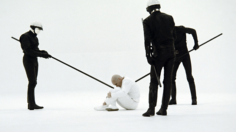 THX 1138 thx being prodded by cops