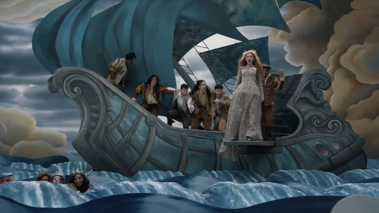 Taylor Swift singing with her backup dancers on a ship during the Fate of Ophelia music video