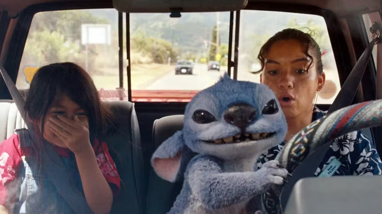 Lilo, Stitch, and Nani sit in Nani's truck in Lilo & Stitch