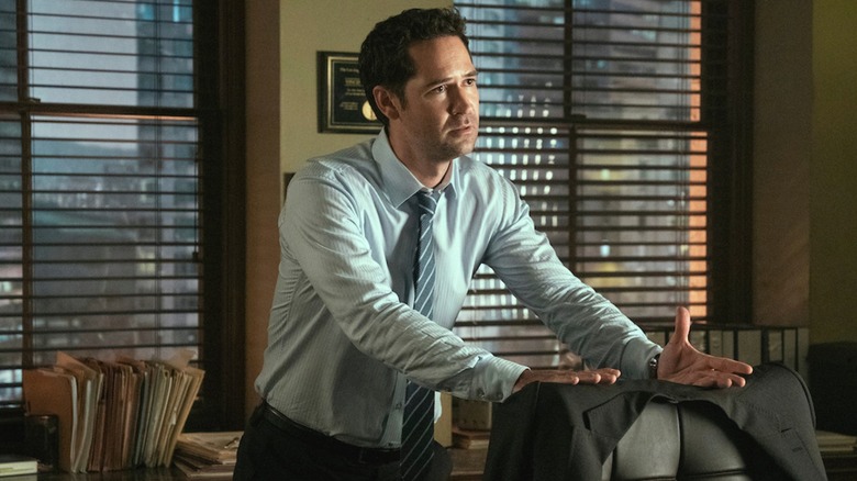 Mickey Haller looks stressed in his office in The Lincoln Lawyer