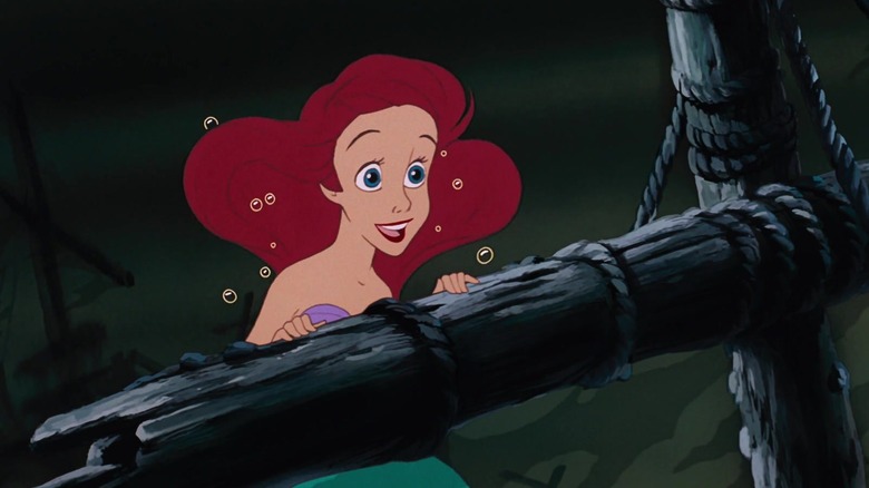Ariel exploring the wreckage of a sunken ship in The Little Mermaid (1989)