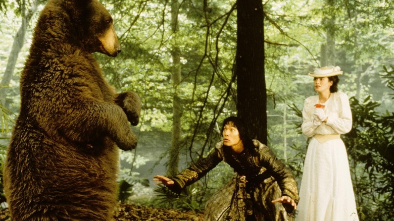 Baloo threatening mowgli and Kitty in the jungle