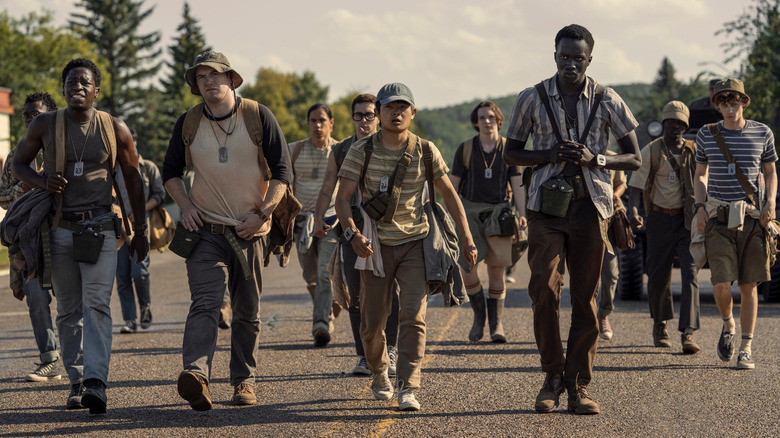 The contestants of The Long Walk start the journey