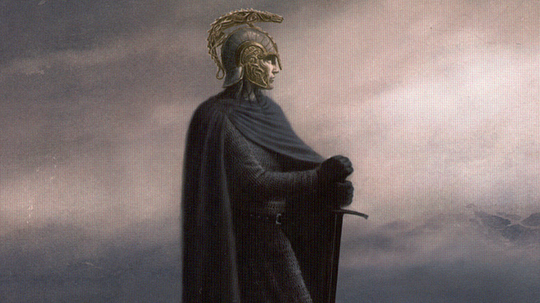Hurin stands, gazing on the book cover of The Children of Hurin
