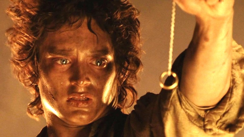 Frodo looks at the One Ring in The Lord of the Rings