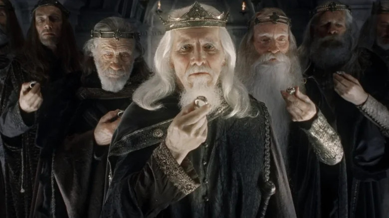 The nine human kings hold their rings solemnly in The Lord of the Rings: The Fellowship of the Ring