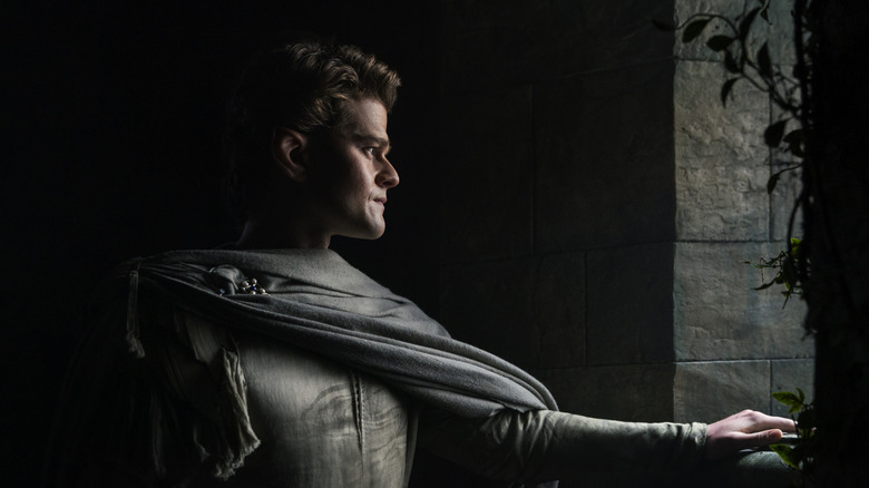 Elrond looks out a window in The Rings of Power