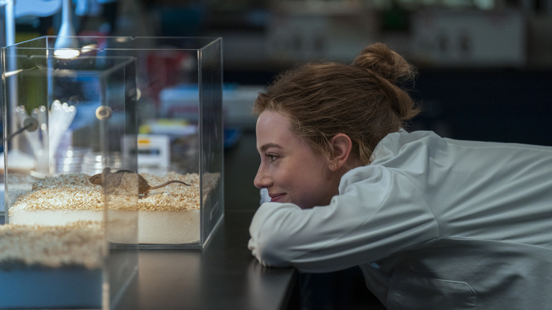 Olive watching the mice for her experiment in The Love Hypothesis