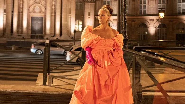 Sarah Jessica Parker wearing an orange dress