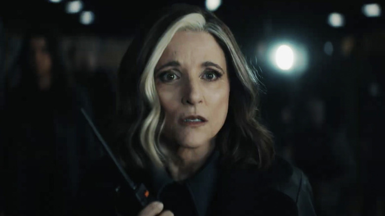 Julia Luis Drifus, director of the CIA, looks shocked by a radio transmission in Thunderbolts