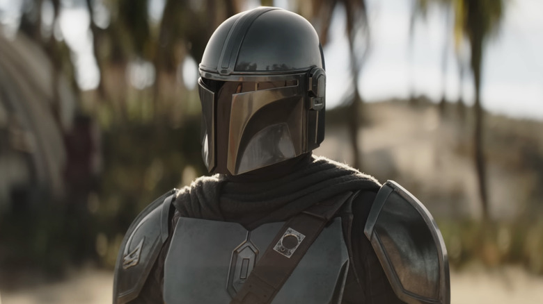 Mando talking to Colonel Ward in The Mandalorian and Grogu