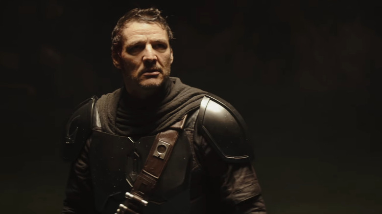 Pedro Pascal as Din Djarin without his helmet in Star Wars: The Mandalorian and Grogu
