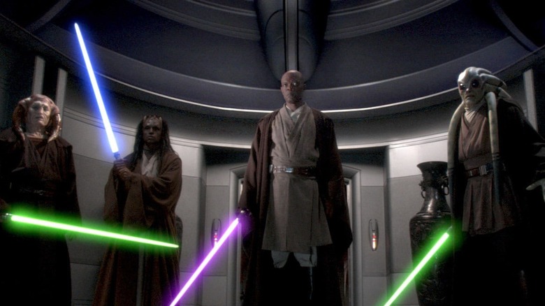Revenge of the Sith's Mace Windu standing among other Jedi with lightsaber