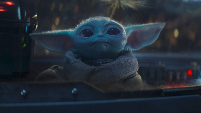Grogu watching fireworks in The Mandalorian