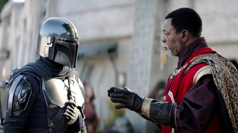 Mando and Greef Carga in The Mandalorian