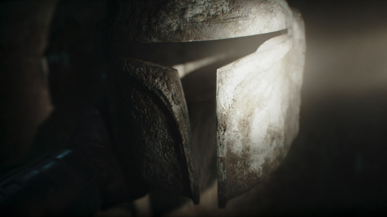 A corroded Mandalorian helmet from The Mandalorian