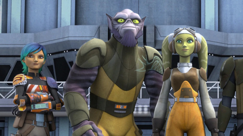 Star Wars Rebels' Zeb standing with Hera Syndulla and Sabine Wren