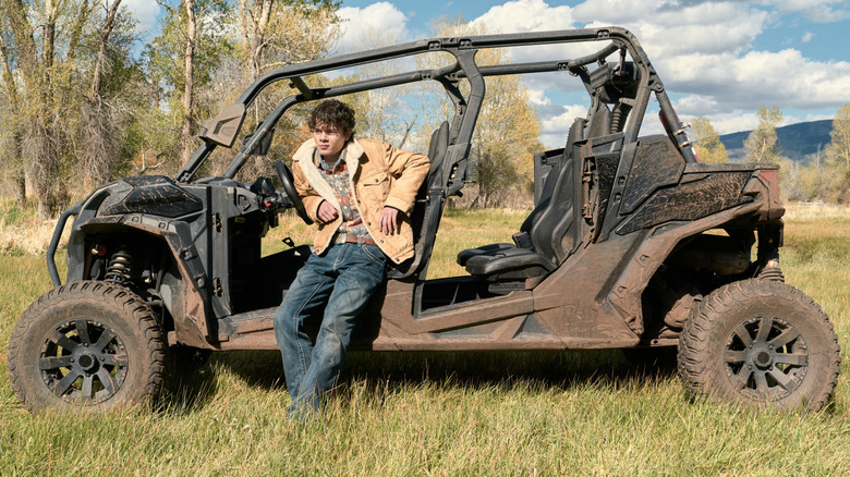 Brecken Merrill's Tate Dutton leans on a buggy in Marshals