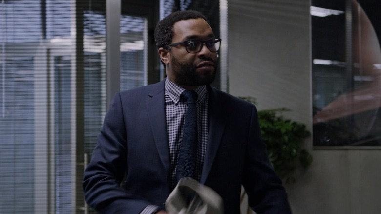 Vincent Kapoor in an office in The Martian