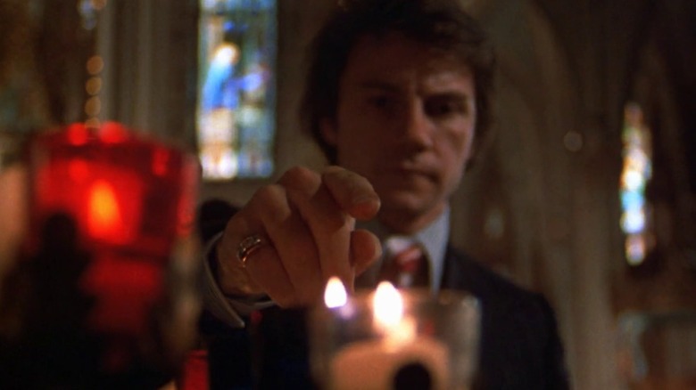 Harvey Keitel Mean Streets holding his finger above candle