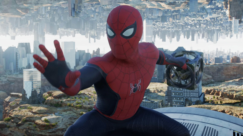 Tom Holland's Spider-Man stands on a train with his hand up in Spider-Man No Way Home