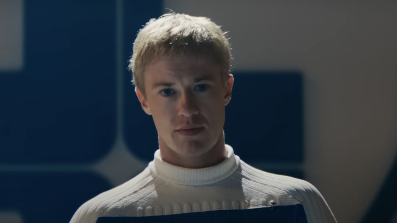 Joseph Quinn's Johhny Storm looks into camera in Fantastic Four First Steps