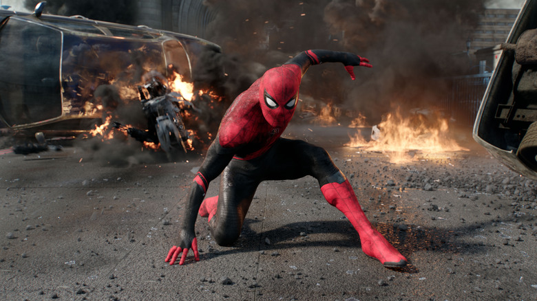 Spider-Man between the burning rubble in Spider-Man: Away from the house