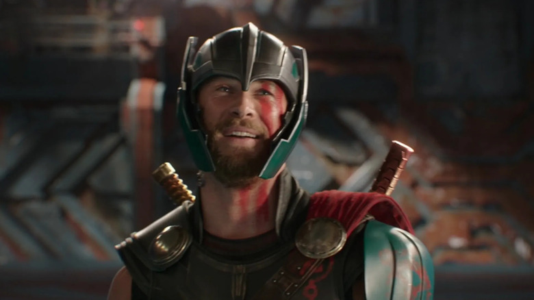 Thor, smiling in a helmet in Thor: Ragnarok