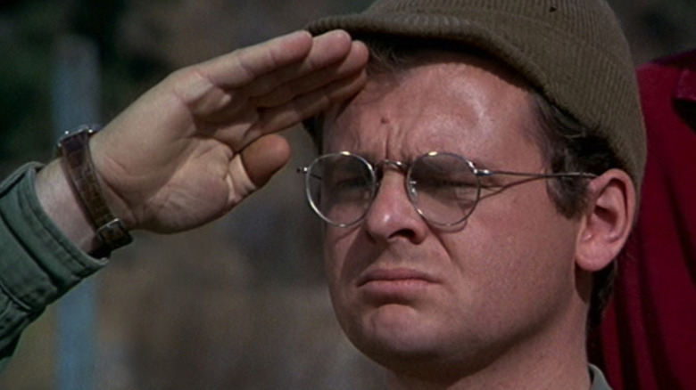 Walter "Radar" O'Reilly saluting solemnly on M*A*S*H