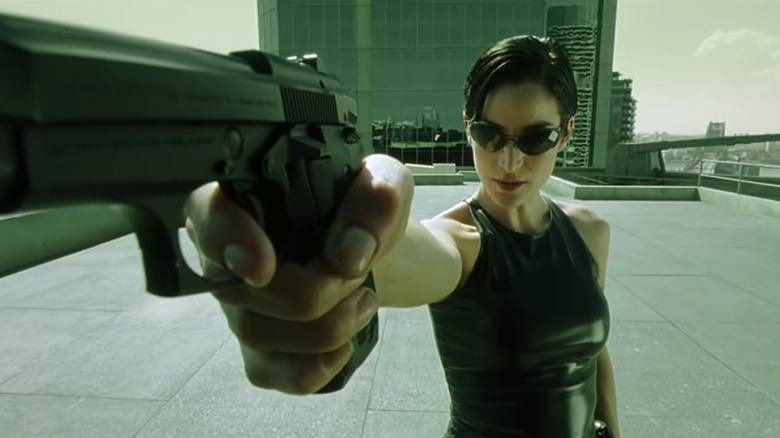Trinity about to shoot an agent